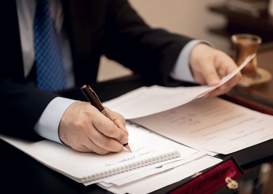 Loan document package being signed